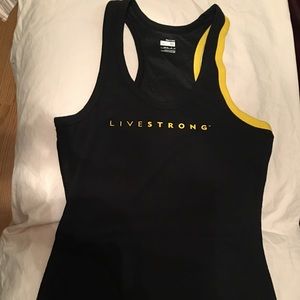 Live strong Nike shirt.